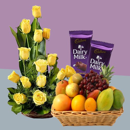 Delectable Dairy Milk Silk with Roses Arrangement and Fruits Basket