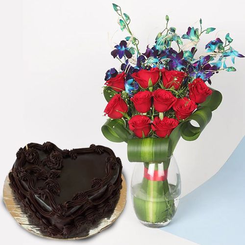 Hearty Red Roses n Blue Orchids in Vase with Heart Shape Choco Cake