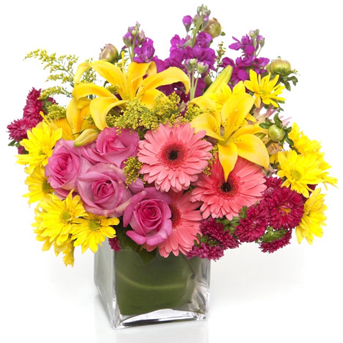 Exquisite Assorted Seasonal Flowers in a Glass Vase