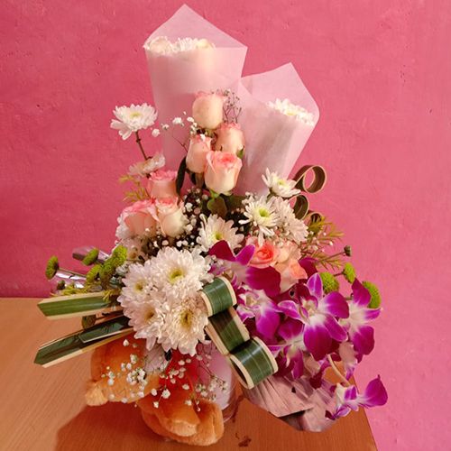 Splendid Mixed Flowers N Teddy Basket Arrangement