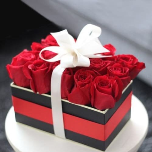 Mesmerizing Red Roses Box Tied with White Ribbon