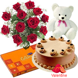 MidNight Delivery ::12 Exclusive  Dutch Red  Roses  Bouquet with Cake  Cadburys Assorted Chocolates and  a Cute Teddy Bear
