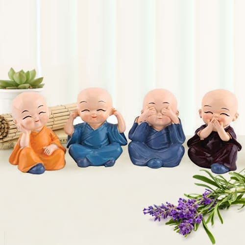 Beautiful Set of 4 Buddha Monks Figurines